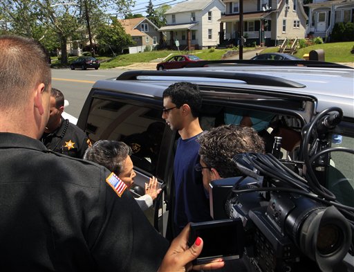 Dharun Ravi, 22, arrives at the Middlesex County sheriff's department in New Brunswick, N.J., today. The former Rutgers University student convicted of using a webcam to spy on his gay roommate reported to the sheriff on his way to jail. Ravi arrived at the sheriff's department shortly after 12:30 p.m. to be fingerprinted and photographed before being driven to the county jail to serve a 30-day term.