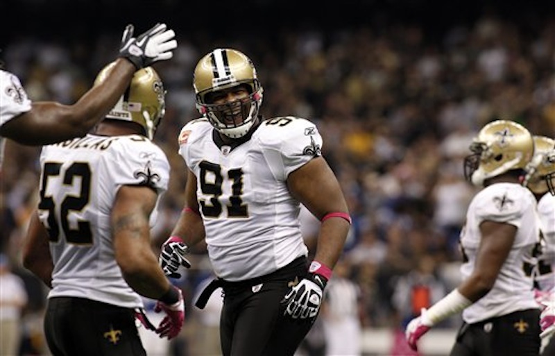 This Oct. 23, 2011 file photo shows New Orleans Saints defensive end Will Smith (91) celebrating after pressuring Indianapolis Colts quarterback Curtis Painter during the first quarter of an NFL football game in New Orleans. Smith is one of four players punished for participating in a pay-for-pain bounty system. NFL Commissioner Roger Goodell's ruling was announced Wednesday, May 2, 2012 (AP Photo/Jonathan Bachman, File) NFLACTION11