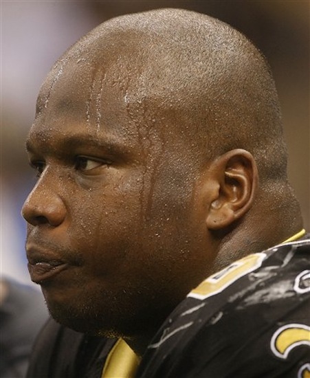 This Dec. 19, 2009 file photo shows New Orleans Saints defensive end Anthony Hargrove on the bench during an NFL football game against the Dallas Cowboys, in New Orleans. Hargrove, now with the Green Bay Packers, is suspended for eight games this season, for participating in a pay-for-pain bounty system. NFL Commissioner Roger Goodell's ruling was announced Wednesday, May 2, 2012. (AP Photo/Dave Martin, DFile)