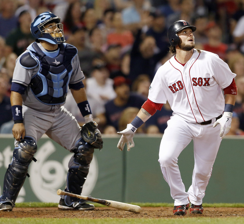 Red Sox catcher Jarrod Saltalamacchia and Rays catcher Jose Molina watch Saltalamacchia's two-run homer at Fenway Park on Saturday. The ninth-inning home run gave the Red Sox the win, 3-2.