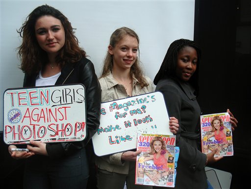 Emma Stydahar, 17, of Croton-on-Hudson, N.Y., left, Julia Bluhm, 14, of Waterville, Maine, and Natasha Williams, 17, of East Flatbush, N.Y., protest outside Seventeen magazine's offices in New York on Wednesday. Bluhm delivered a petition and met with officials from the magazine urging them to publish one spread a month of model photos that have not been altered. She says images of young girls in the magazine present an impossible ideal for today's teens.