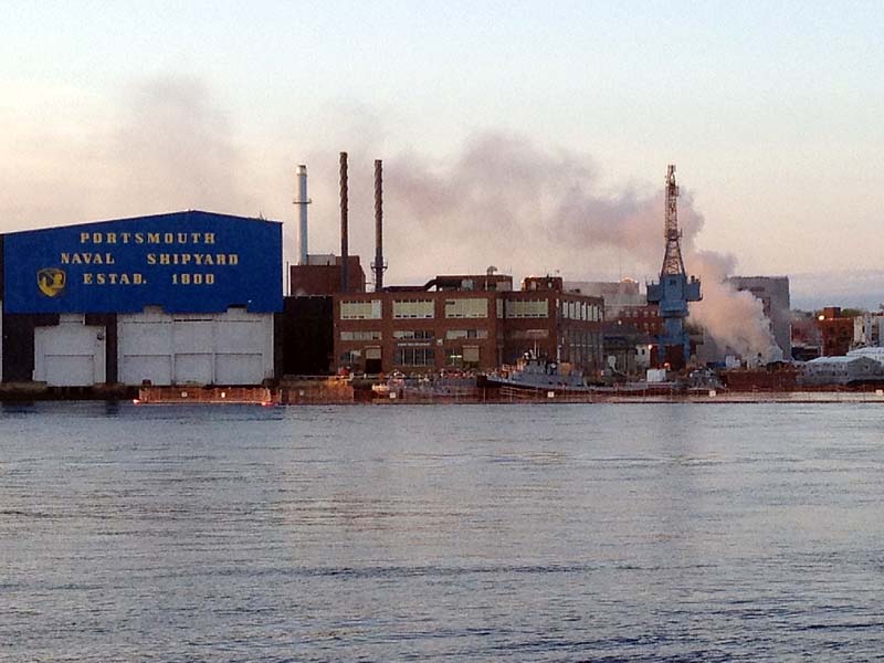 A fire burns on a nuclear submarine at the Portsmouth Naval Shipyard in Kittery on Wednesday.