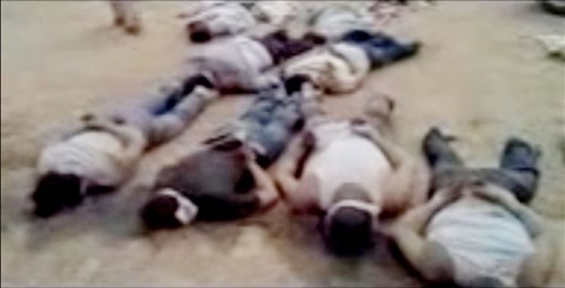 In this image made from amateur video released by the Shaam News Network and accessed Tuesday, May 29, 2012, purports to show 13 blindfolded and handcuffed bodies on the ground in Deir el-Zour, Syria. U.N. observers have discovered 13 bound corpses in eastern Syria, many of them apparently shot execution-style, the monitoring mission said Wednesday. (AP Photo/Shaam News Network via AP video)