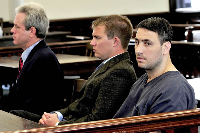 HEARING: Murder defendant Angelo Licata, right, sits with his attorneys Peter Barnett, left, and Francis Griffin during a hearing in Somerset County Superior Court in Skowhegan on Thursday.