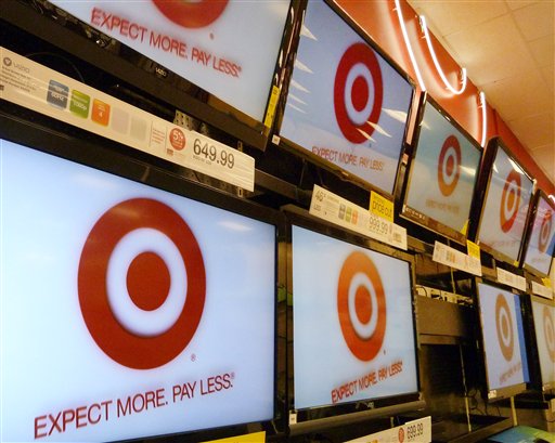 FILE- A Feb. 20, 2012, file photo, shows flat screen televisions at a Target store in Methuen, Mass. Target Corp. is reporting a 1.2 percent increase in first-quarter profit as the discounter pulled in more shoppers for food and trendy fashions. Target�s results come as economists are carefully dissecting consumer spending trends amid growing economic uncertainty. Like many retailers, Target saw that business in April 2012 was disappointing as warmer-than-usual weather earlier in February and March and an early Easter pulled sales forward. (AP Photo/Elise Amendola, File)