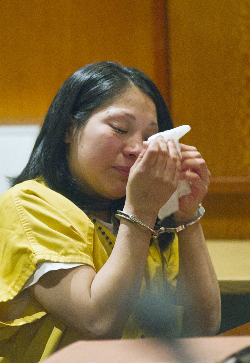 Karla Wilson wipes back tears as she appears before Superior Court Justice Roland Cole on Thursday. Wilson was sentenced to 25 years, with all but 10 years suspended, and four years of probation for sexual assault.