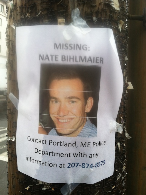 A poster on Commercial Street shows the face of Nathan Bihlmaier, 31, who vanished in Portland early Sunday morning.