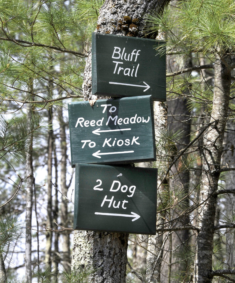 Trail signs point visitors to various landmarks and trails in the quiet haven of Jefferson. On a busy day, the center gets 100 guests.