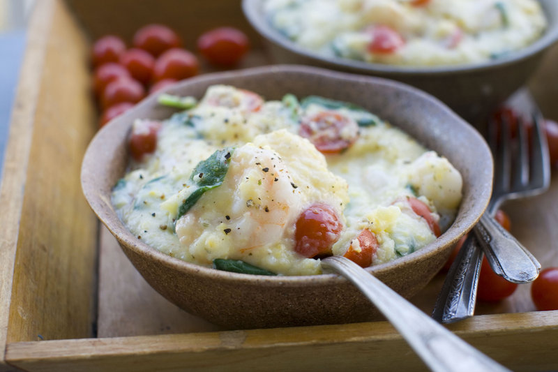 Cookbook author Nathalie Dupree’s shrimp and grits with spinach and tomatoes.