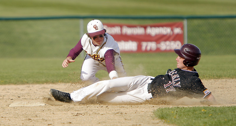 Sam Porter of Greely beats the tag of Charlie Laprade of Cape Elizabeth and is safe at second in Monday’s baseball game at Cumberland.