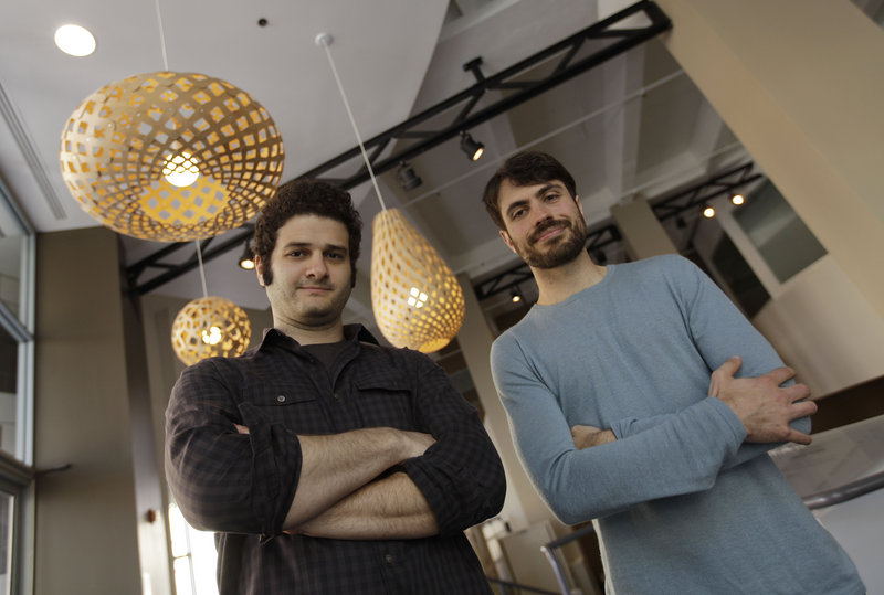 Dustin Moskovitz, left, and Justin Rosenstein, co-founders of the San Francisco-based software company Asana, are working on an online collaboration app that Moskovitz says will become the world’s next $100 billion company.