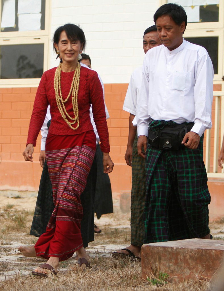 Aung San Suu Kyi, left.