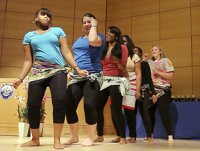 University of New England students, from left, Veneranda Kirway, Bailey Booras, Melissa Hue, Chinonye Okeke, Amanda Madu and Jessica Breslin perform a dance Tuesday night at the Multicultural and International Graduation Celebration at Hannaford Hall at the University of Southern Maine in Portland. Students from UNE, USM and Southern Maine Community College took part.