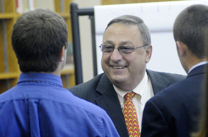 Gov. Paul LePage speaks with Cheverus High School students on Wednesday.