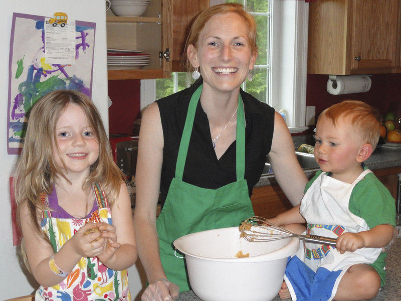Erin Moulton cooks with her children Natalie and Cameron in her Windham kitchen.