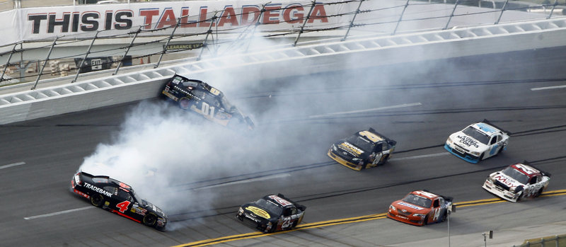 The Nationwide race on Saturday featured several accidents, including this one involving Danny Efland, 4, and Mike Wallace, 01, on Turn 4 at Talladega Superspeedway. Joey Logano nipped Kyle Busch for the win.