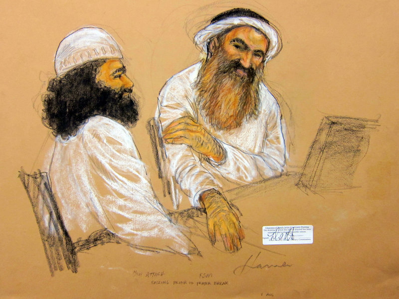 Alleged 9/11 mastermind Khalid Sheikh Mohammed, right, and Walid bin Attash, one of his four co-defendants, attend a military hearing at the Guantanamo Bay Naval Base on Saturday.