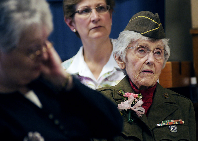 Norma Doody of Westbrook looks on during the State of Maine Silver Commemorative Coin presentation at the Maine Veterans Home in Scarborough on Monday. Doody received the coin for her service in the Army during World War II.