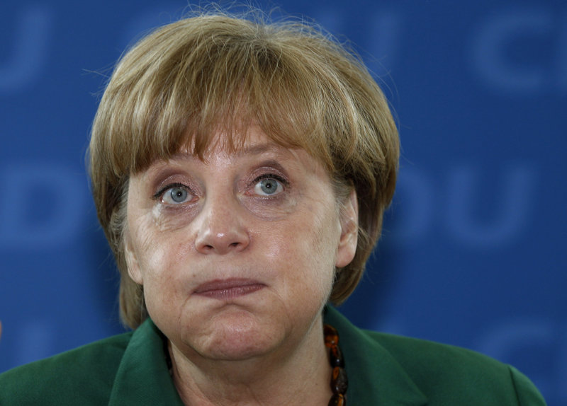 German Chancellor Angela Merkel reacts at a meeting of the German Christian Democratic party in Berlin on Monday. Voters in Germany’s northernmost state on Sunday ousted a governing center-right government made up of the same parties as Merkel’s federal coalition. For Merkel, the defeat could be an omen of worse to come.