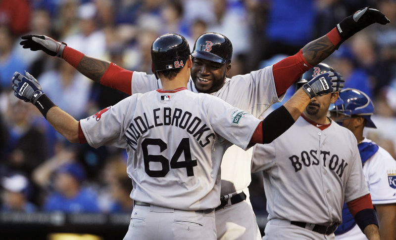 A big hug from Big Papi. That’s what was waiting for Will Middlebrooks after his three-run homer in the first Monday in Kansas City. Middlebrooks later added a two-run shot.