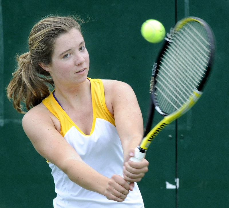 Maria Cianchette of Cheverus keeps her eye on the ball during a return in the match against McAuley.