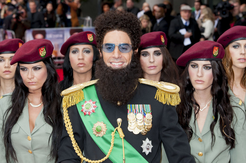 In character, British actor Sacha Baron Cohen arrives for the world premiere of "The Dictator," at a central London cinema Thursday.