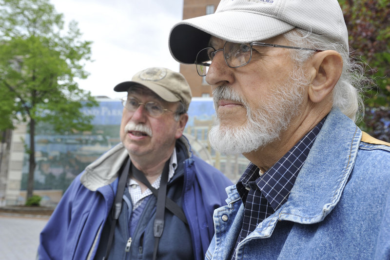 Landscape architect Anthony Muench, left, and his friend Charles Alden, a retired urban planner, visited the park recently and said the public space has value to the city and could be improved by altering its design.