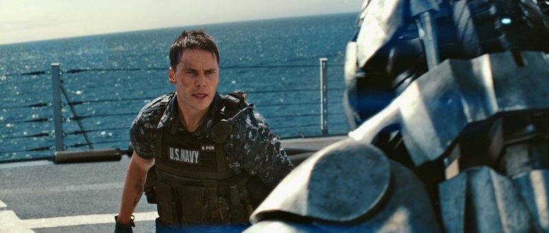 Taylor Kitsch comes face to face with an alien invader.