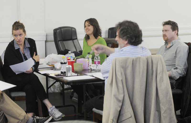 Moira Driscoll, left, Tess Van Horn, director Andrew Harris and Mark Honan dissect and discuss during rehearsal.