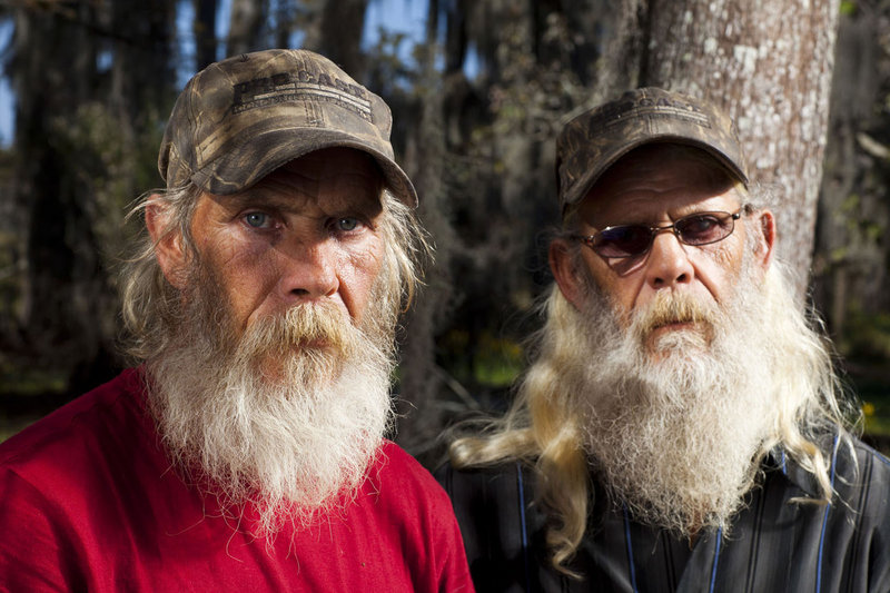 Mitchell Guist, left, and his brother Glenn, from the series “Swamp People” in a photo from History. Mitchell Guist died Monday after falling on his boat.