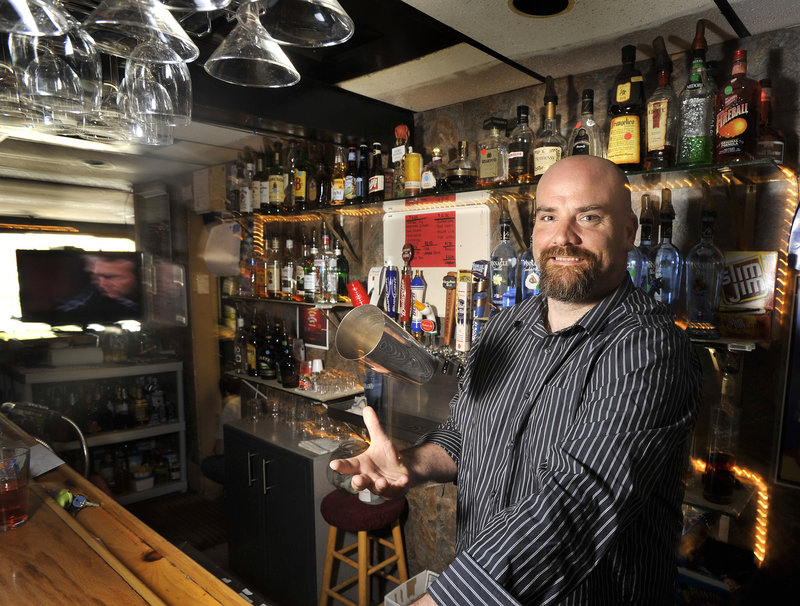 Bartender Scott Maher works at Spring Point Tavern in South Portland, which draws a diverse crowd and hosts trivia, water pong, karaoke and live bands.