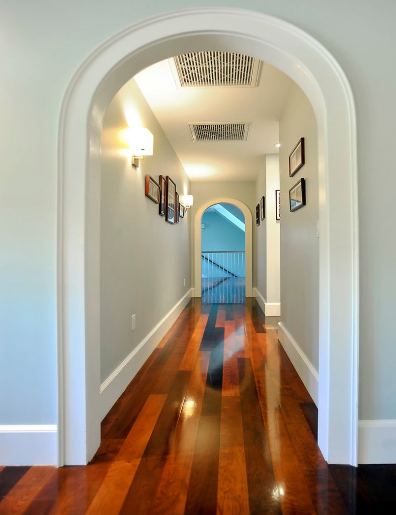 An upstairs hallway connecting bedrooms on either side of the house.