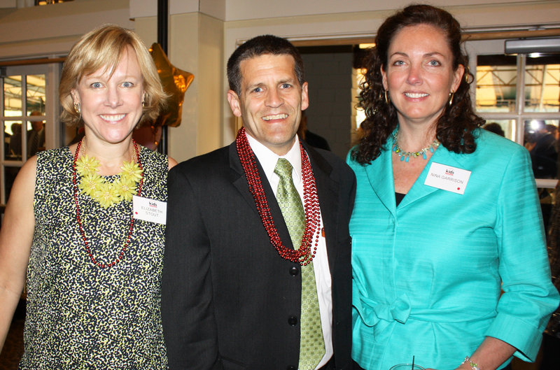 Board president Liz Stout of Givertz, Schefee & Lavoie, Don Legere of Cross Insurance and Nina Garrison of Signature Capital.