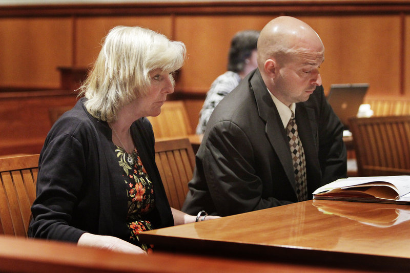 Laureen Rugen appears in Superior Court in Portland Friday with her lawyer J.P. DeGrinney. Rugen was arrested for violating her probation but will not serve any more jail time.