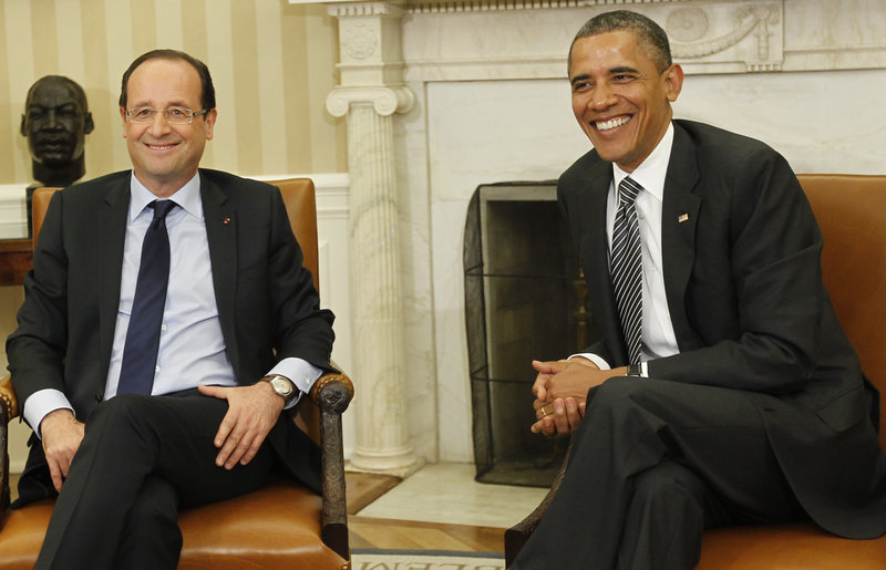 President Obama meets with newly elected French President Francois Hollande on Friday in the Oval Office of the White House in Washington.
