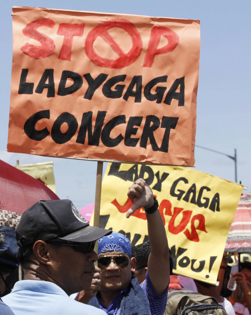 Protesters turn out Saturday in Manila to greet Lady Gaga.