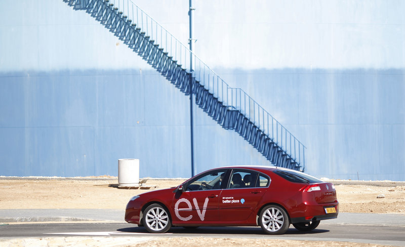 An electric car is seen at a demonstration by the company Better Place in Tel Aviv, Israel. Renault is selling a sedan that is customized to use Better Place’s network of battery stations.