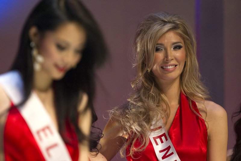 Jenna Talackova, right, the first transgender Miss Universe contestant, takes the stage Saturday in the Miss Universe Canada pageant.