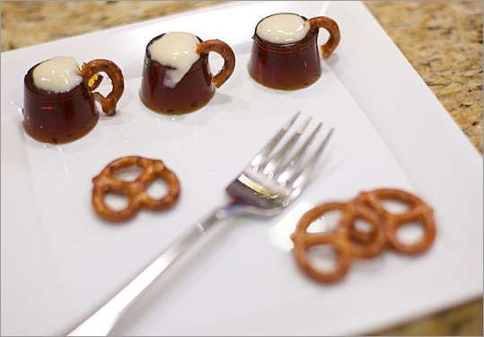 Matthew Micari's Rootbeer Mugs are made with root beer gelatin, topped with whipped foam and garnished with pretzel handles.