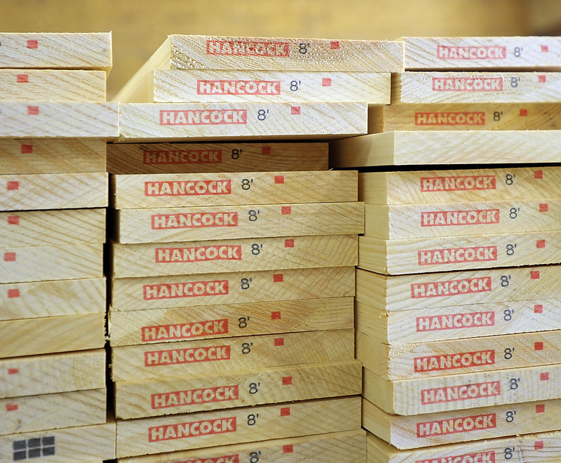 Each board is stamped with the Hancock name and length.