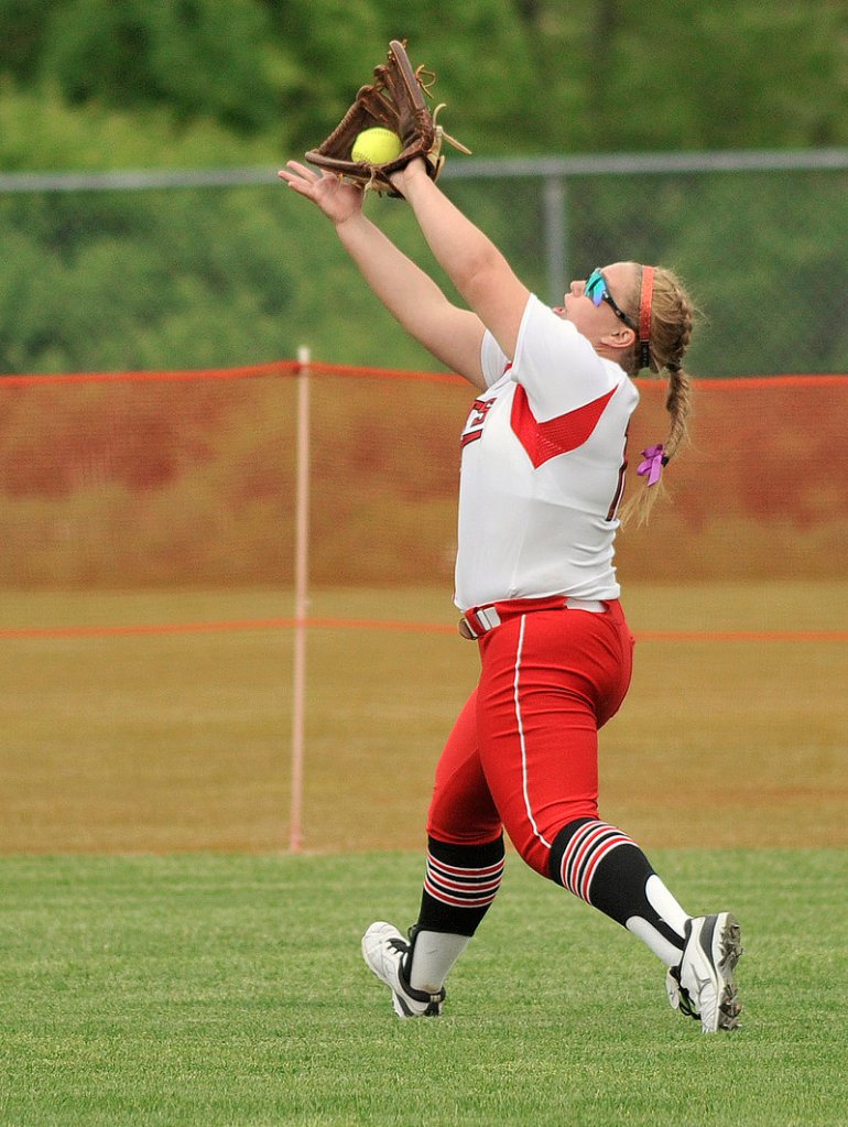 South Portland center fielder Olivia Indorf catches a fly ball during the Red Riots' 17-1 win Monday over Biddeford.