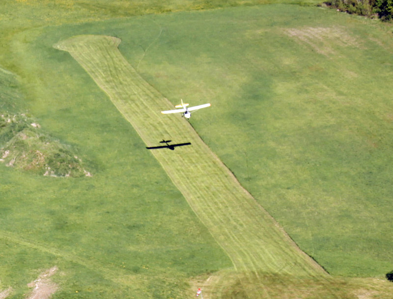 Shawn Moody lands an experimental aircraft on a grass strip at his friend and fellow pilot John Pompeo’s home in Buxton. Moody says he finds his pastime to be relaxing: “You’re so focused on flying, you kind of forget about everything else.”