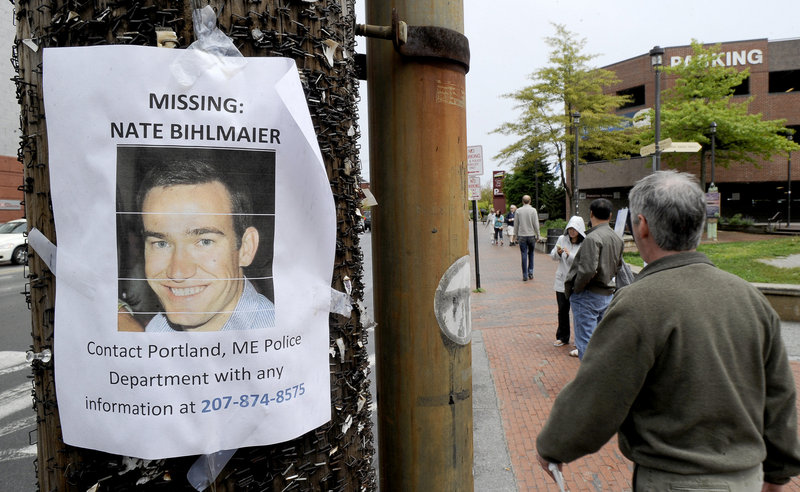 A flier alerting the public to the disappearance of Nathan Bihlmaier is posted on Portland’s waterfront last Tuesday. His body was found last Wednesday.