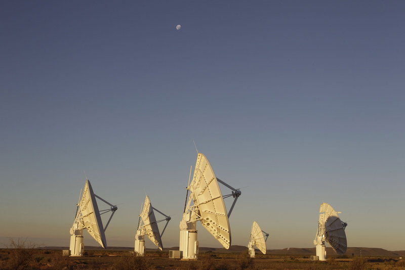Telescope dishes stand near the town of Carnarvon, South Africa, a remote site in the Karoo desert where dishes will be added for the proposed Square Kilometer Array radio telescope project.