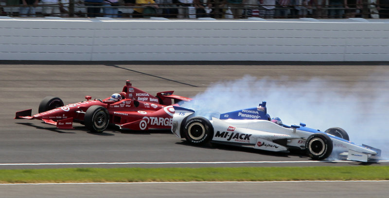 Dario Franchitti maintains his lead as Takuma Sato spins out while trying to pass on the last lap of the Indianapolis 500 on Sunday. Franchitti won for the third time.