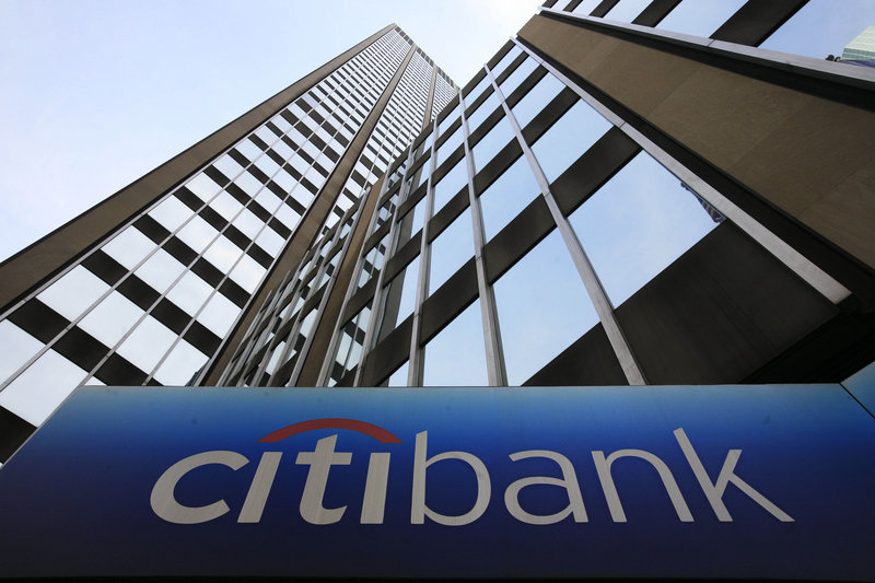 A sign for Citibank is seen at Citigroup headquarters in New York. Citigroup’s acquisition of Salomon Smith Barney in 1998 is one of the events that marked the entry of banks into risky ventures “to aggrandize more power and assumed prestige for CEOs and shareholders,” a reader says.