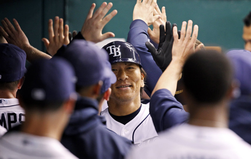Hideki Matsui returned to the majors Tuesday night and promptly hit a home run for the Tampa Bay Rays, who were beaten at home by the Chicago White Sox, 7-2.