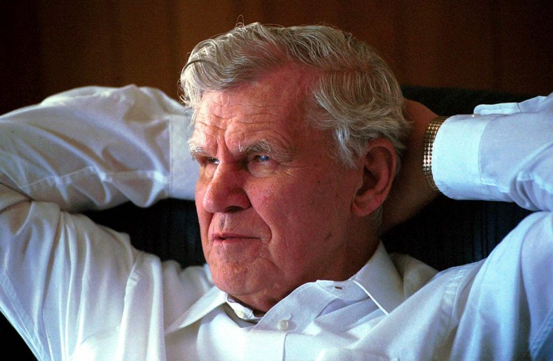 Doc Watson, shown in 2000, was revered by younger musicians for his guitar-playing talent, but his generosity put them at ease.