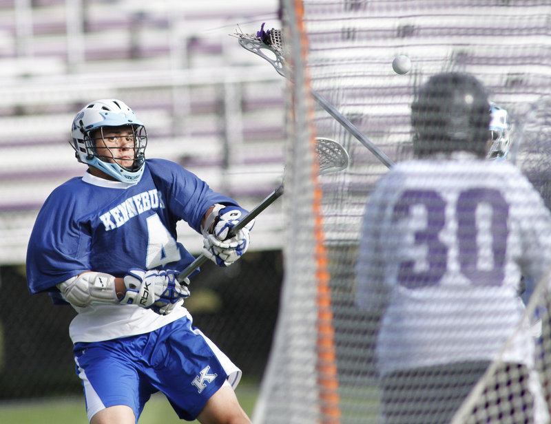 Harrison Hall of Kennebunk fires a first-quarter shot Wednesday during the 10-4 victory against Deering that ended the schoolboy lacrosse regular season. Kennebunk finished with a 9-3 record. Deering was 7-5.