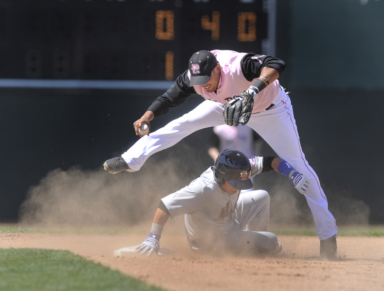 Juan Centeno of the Binghamton Mets slides into second base Saturday, disrupting Ryan Dent of the Portland Sea Dogs and breaking up a potential double play.